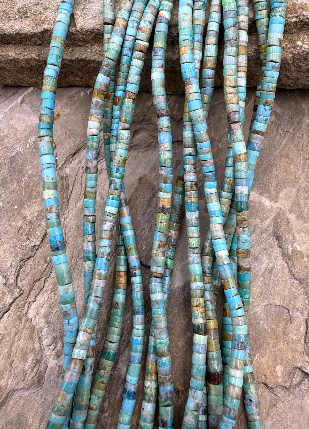 Hubei Turquoise (China) 4x2mm Heishi 16 inch Strand